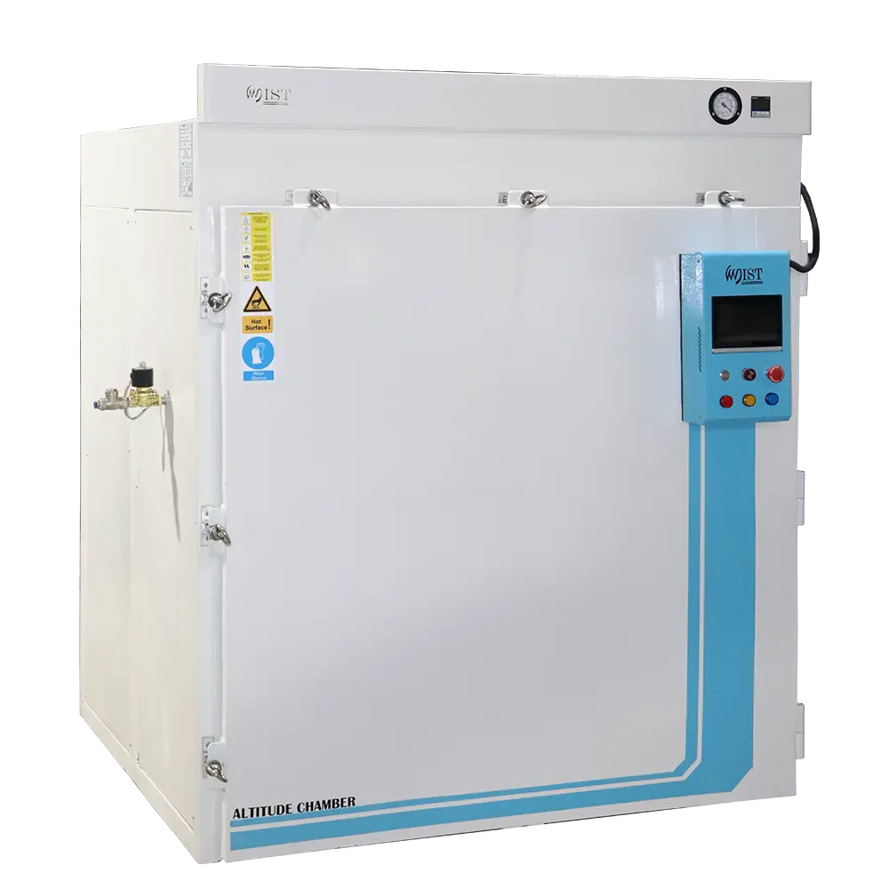 WIST low-pressure hypobaric chamber with the door slightly ajar, revealing the thick seal and a side-mounted access port for connections during altitude simulation testing.