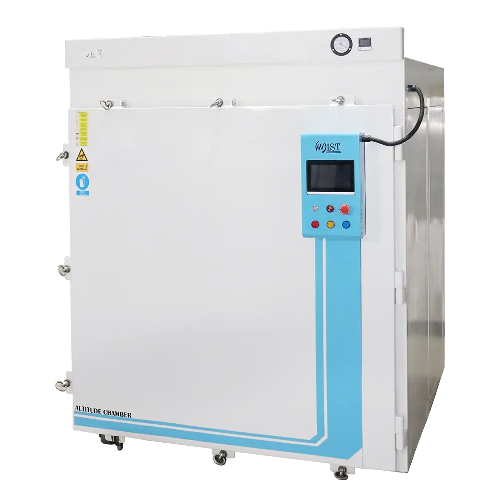 Front view of a white WIST altitude chamber for environmental testing, featuring a large sealed door, a digital control panel, and a pressure gauge on top.